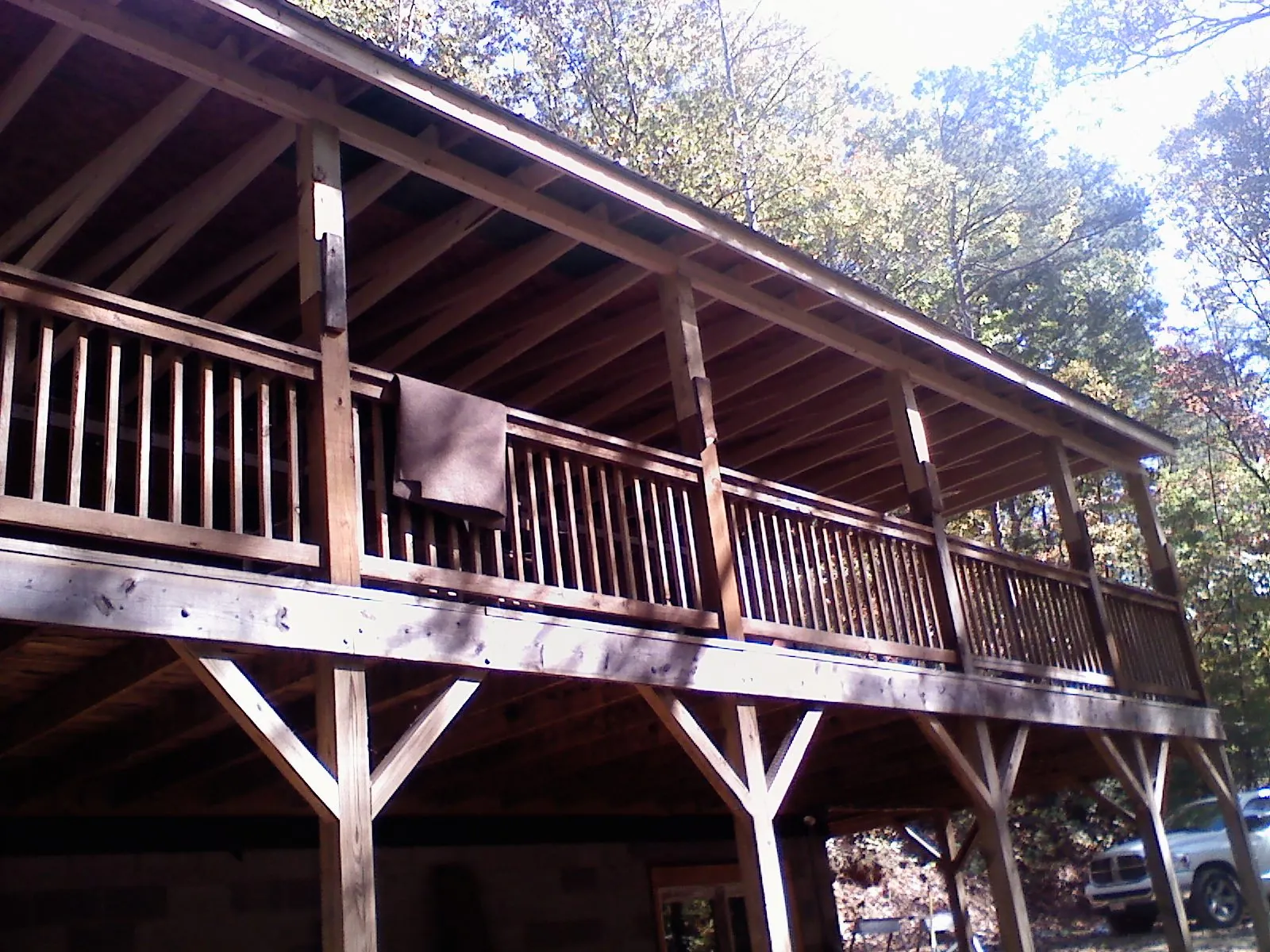 Timber framing under a new elevated porch and deck — Roof Leak Repair in Groves by Roofing Brothers